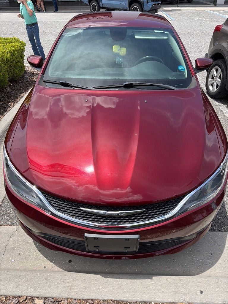 2017 Chrysler 200 LX in Velvet Red Pearlcoat — front three-quarter view