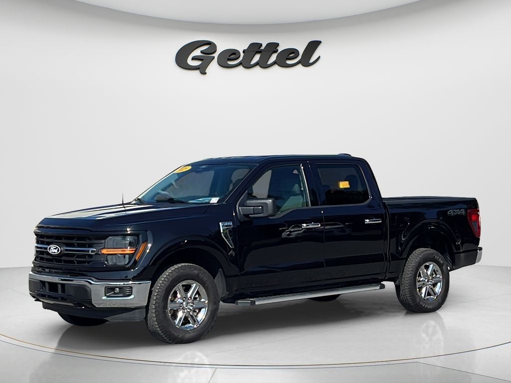 2025 Ford F-150 XLT in Agate Black Metallic — front three-quarter view