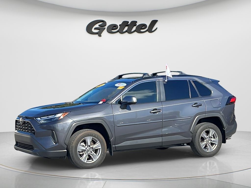 2024 Toyota RAV4 XLE in Magnetic Gray Met. — front three-quarter view