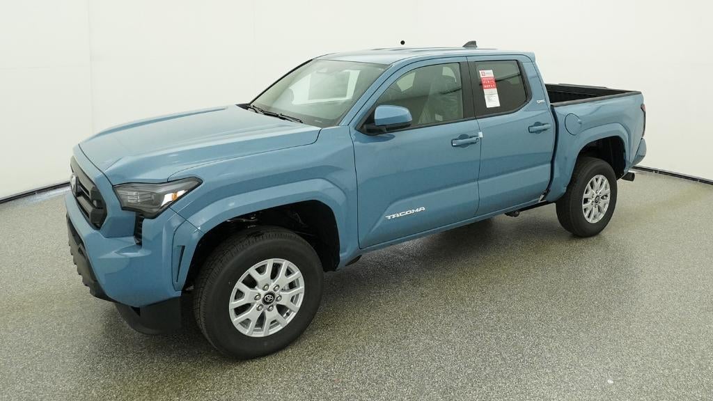2026 Toyota Tacoma SR5 in Heritage Blue — front three-quarter view