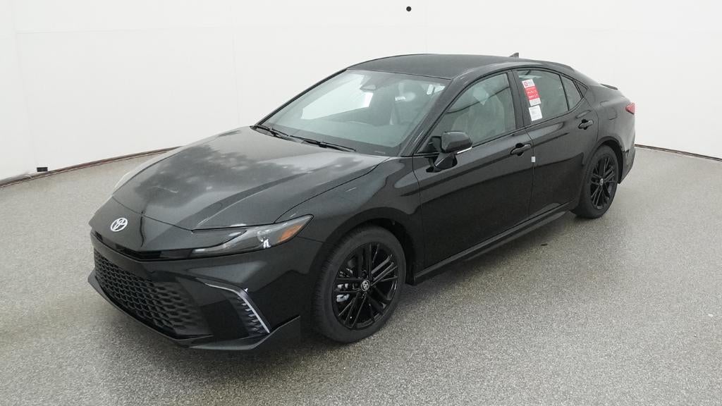 2026 Toyota Camry SE in Midnight Black Metallic — front three-quarter view
