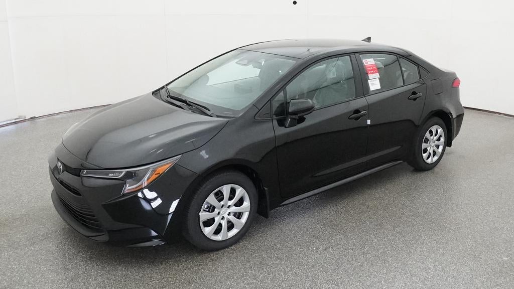 2026 Toyota Corolla LE in Midnight Black Metallic — front three-quarter view