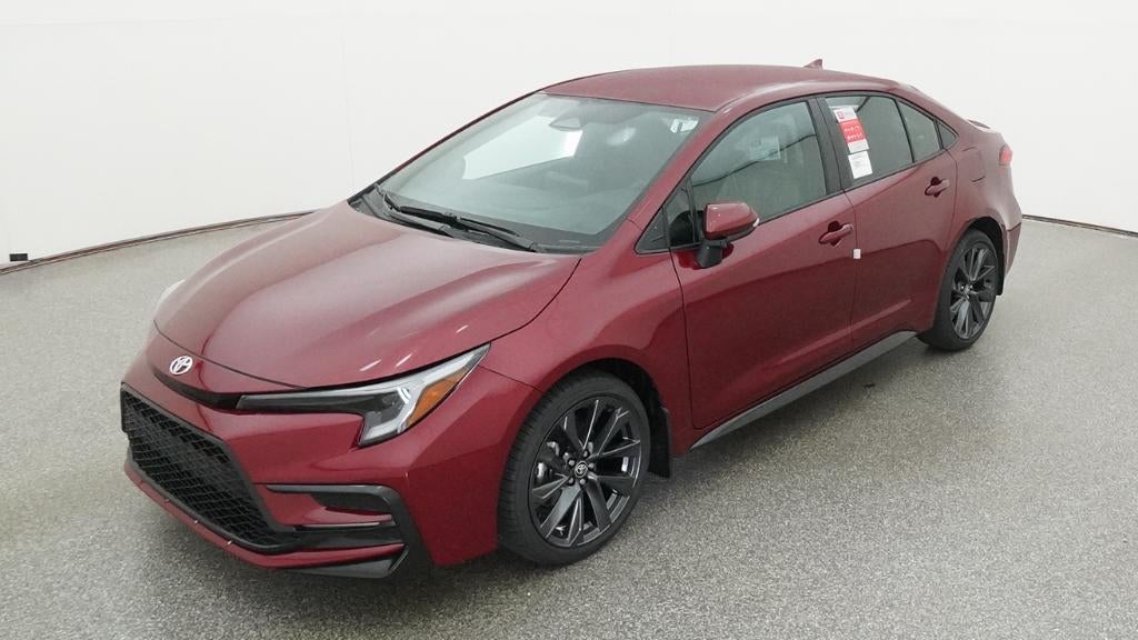 2026 Toyota Corolla SE in Ruby Flare Pearl <a role='button' class='viewDgDisclaimersButton' data-toggle='modal'...