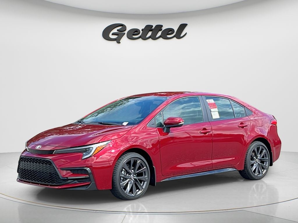 2026 Toyota Corolla SE in Ruby Flare Pearl <a role='button' class='viewDgDisclaimersButton' data-toggle='modal'...