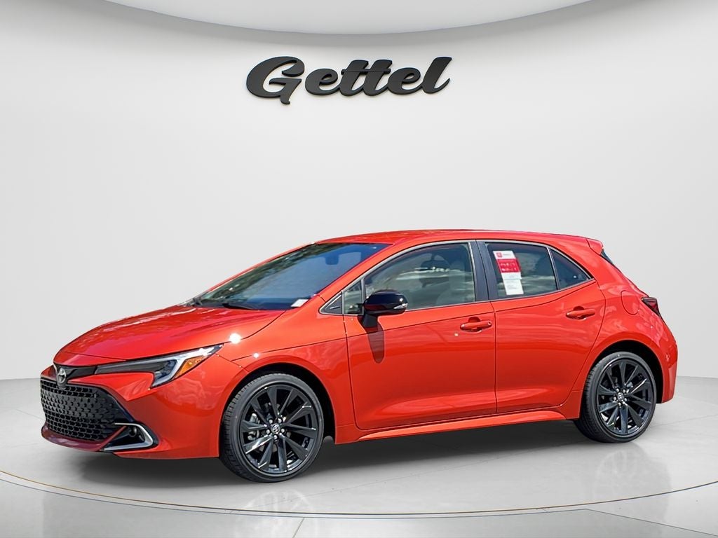 2026 Toyota Corolla Hatchback XSE in Inferno — front three-quarter view